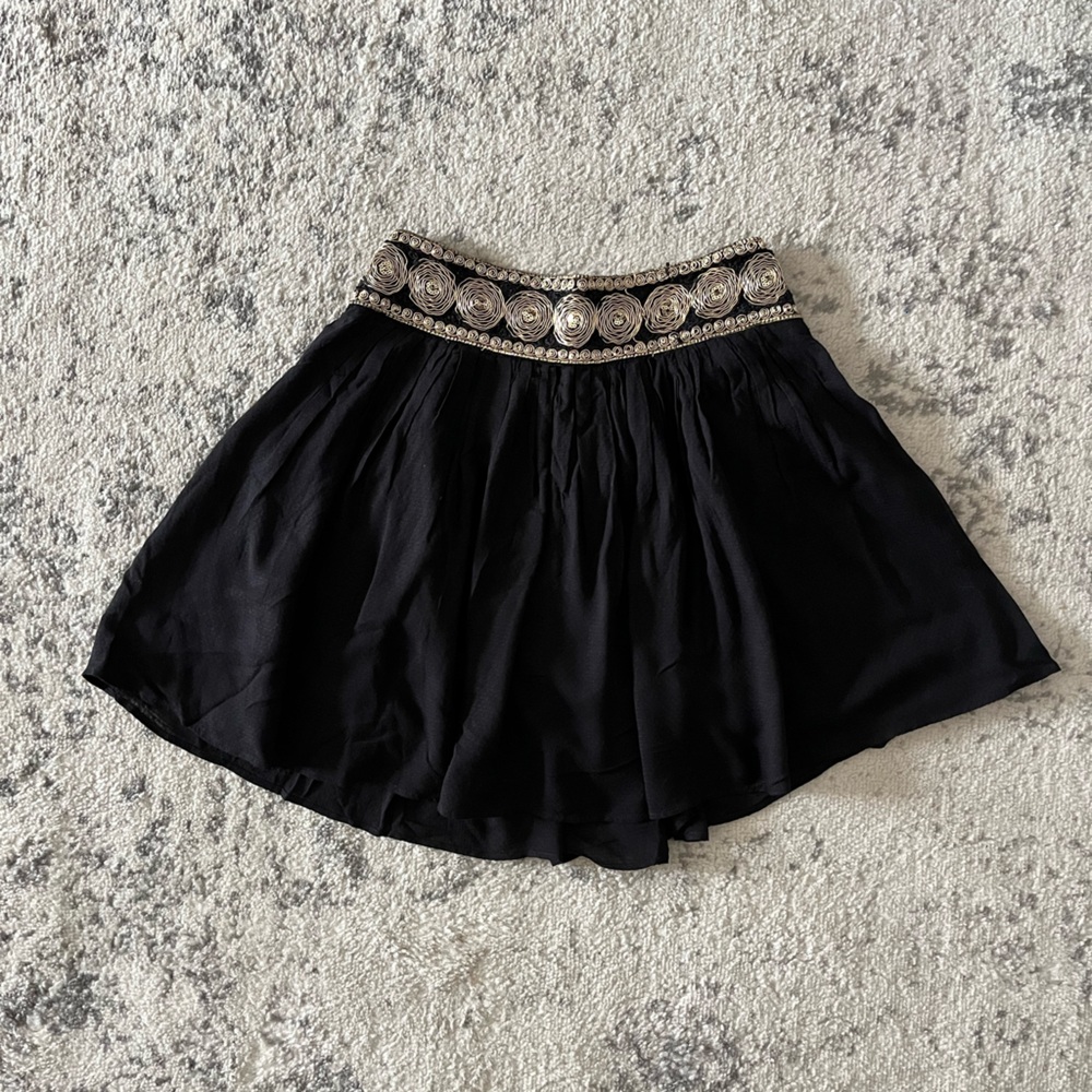 Gold detail mini skirt from Barcelona